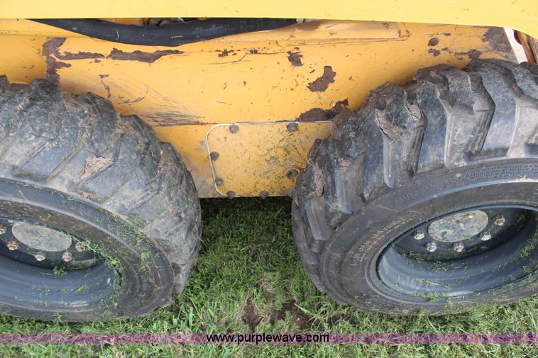 image for item H6519 1999 John Deere 250 skid steer