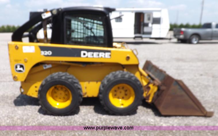 image for item I7651 2006 John Deere 320 skid steer
