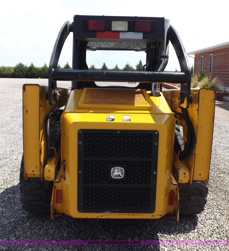 image for item I7651 2006 John Deere 320 skid steer