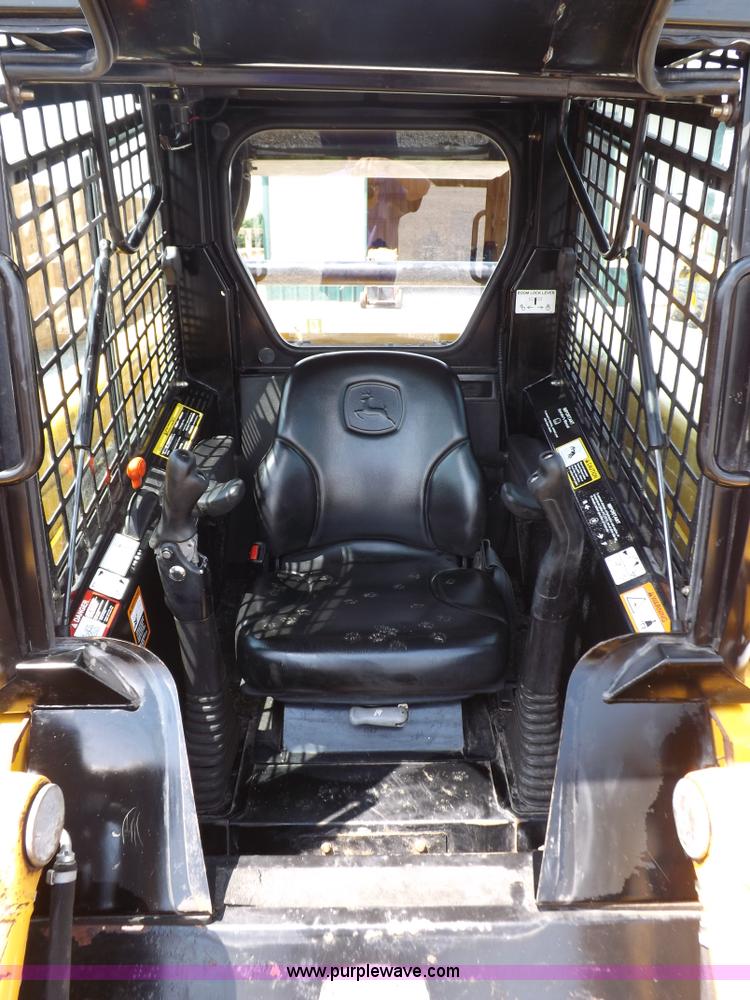 image for item I7651 2006 John Deere 320 skid steer