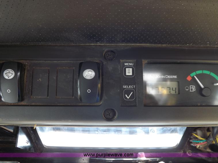 image for item I7651 2006 John Deere 320 skid steer