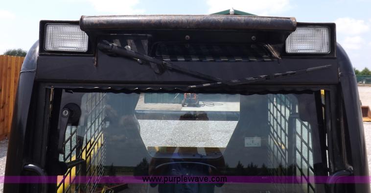 image for item I7651 2006 John Deere 320 skid steer