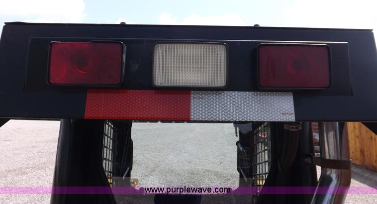 image for item I7651 2006 John Deere 320 skid steer