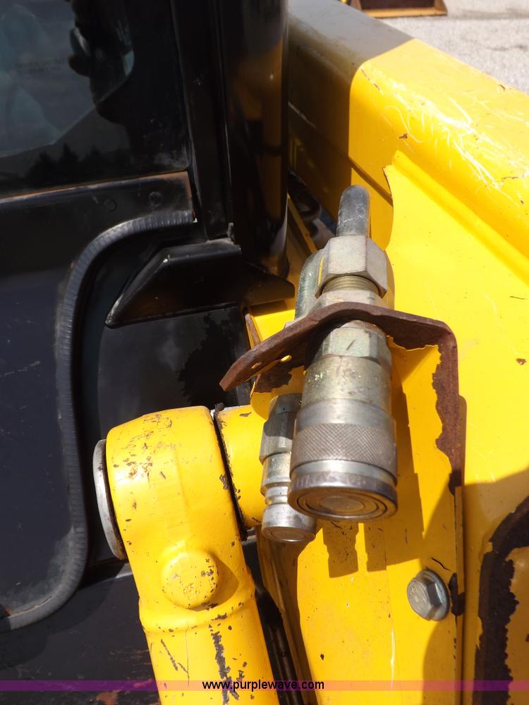 image for item I7651 2006 John Deere 320 skid steer