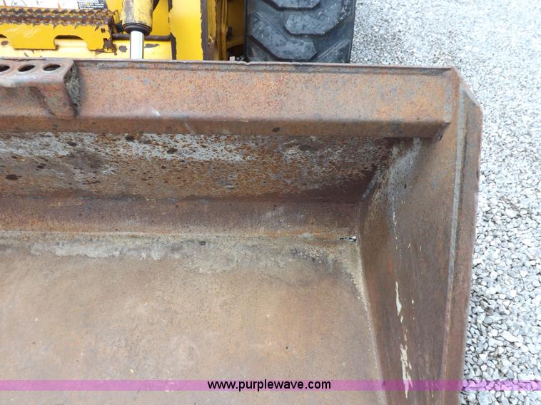 image for item I7651 2006 John Deere 320 skid steer