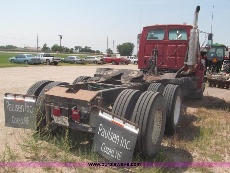image for item F7088 1997 Ford LT9513 Louisville 113 triple axle semi truck