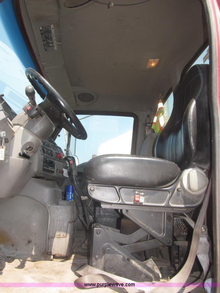 image for item F7088 1997 Ford LT9513 Louisville 113 triple axle semi truck