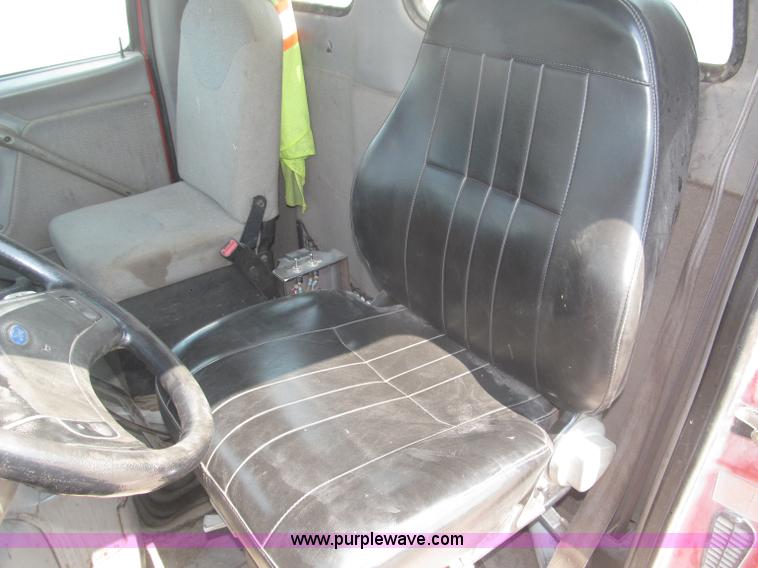 image for item F7088 1997 Ford LT9513 Louisville 113 triple axle semi truck