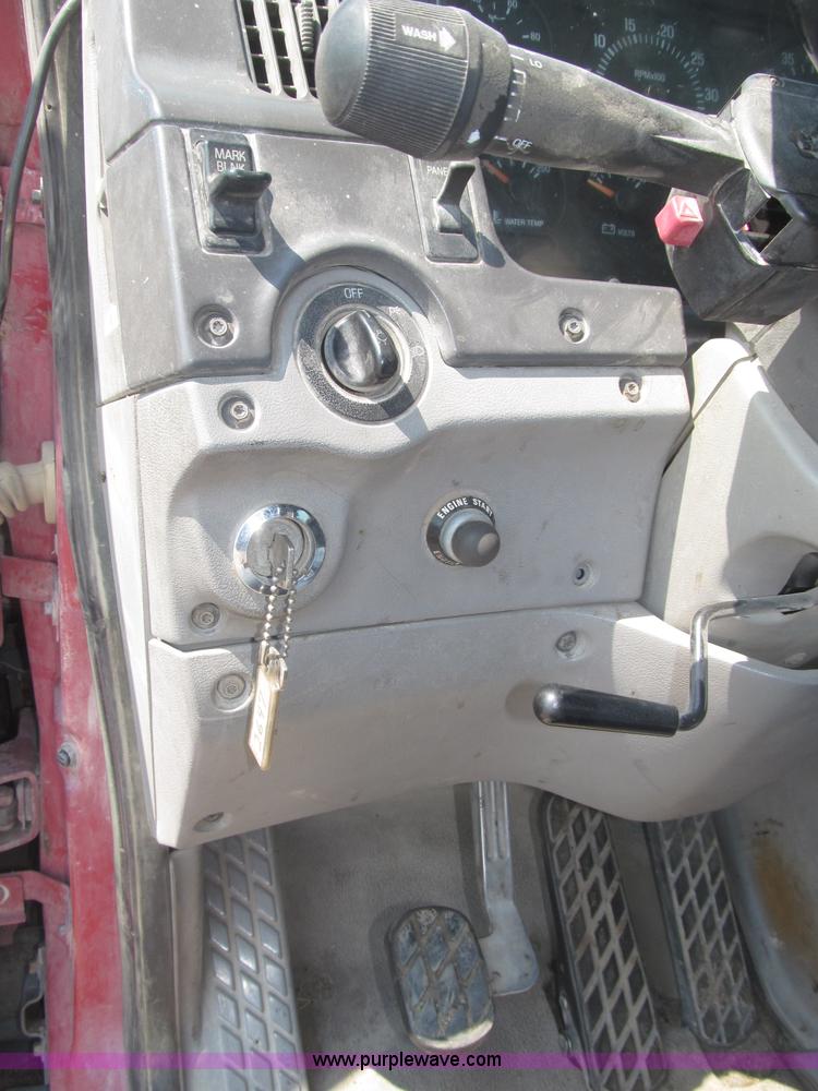 image for item F7088 1997 Ford LT9513 Louisville 113 triple axle semi truck