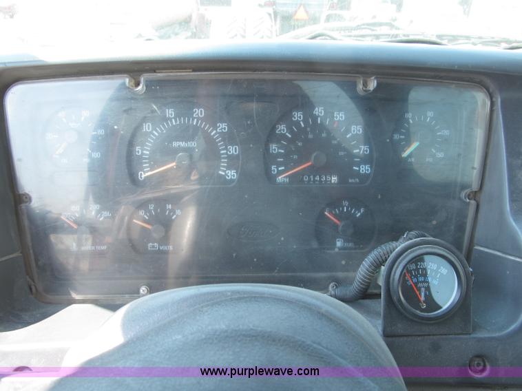 image for item F7088 1997 Ford LT9513 Louisville 113 triple axle semi truck