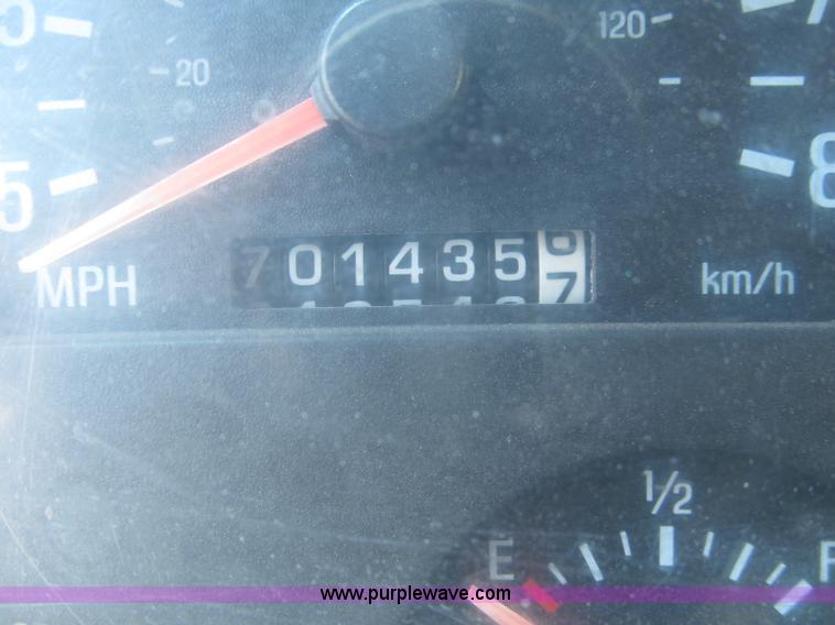 image for item F7088 1997 Ford LT9513 Louisville 113 triple axle semi truck