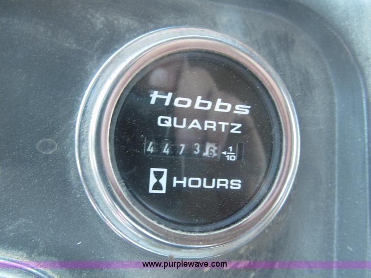 image for item F7088 1997 Ford LT9513 Louisville 113 triple axle semi truck