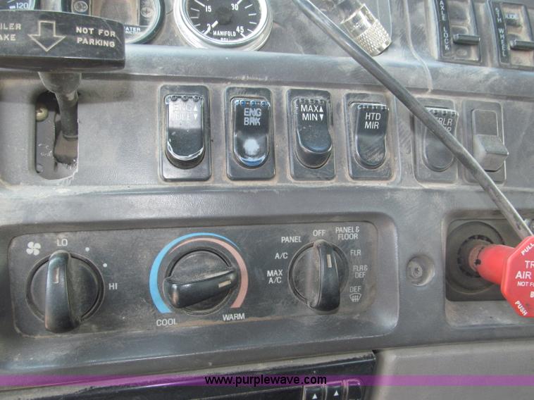 image for item F7088 1997 Ford LT9513 Louisville 113 triple axle semi truck