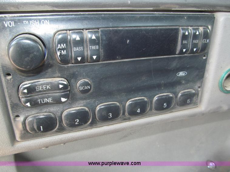 image for item F7088 1997 Ford LT9513 Louisville 113 triple axle semi truck