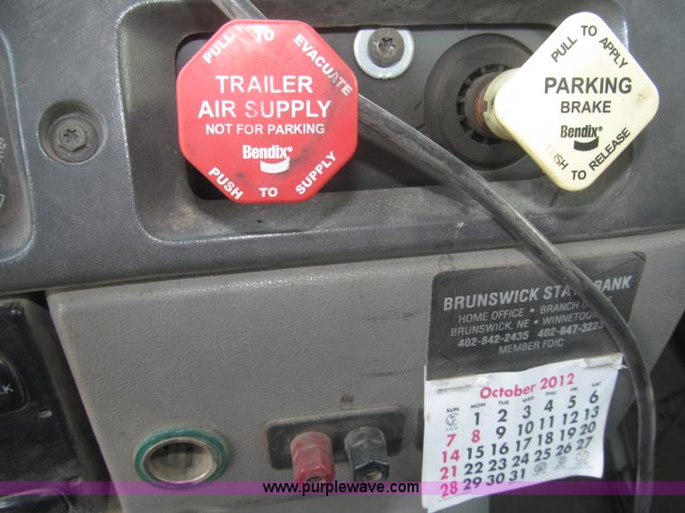 image for item F7088 1997 Ford LT9513 Louisville 113 triple axle semi truck