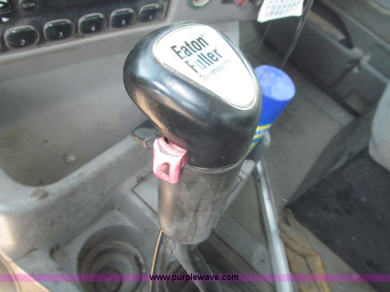 image for item F7088 1997 Ford LT9513 Louisville 113 triple axle semi truck