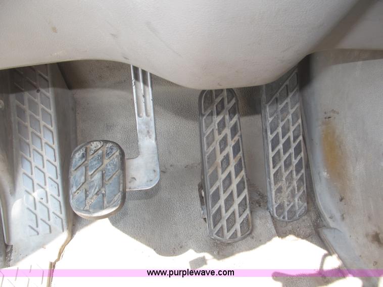 image for item F7088 1997 Ford LT9513 Louisville 113 triple axle semi truck