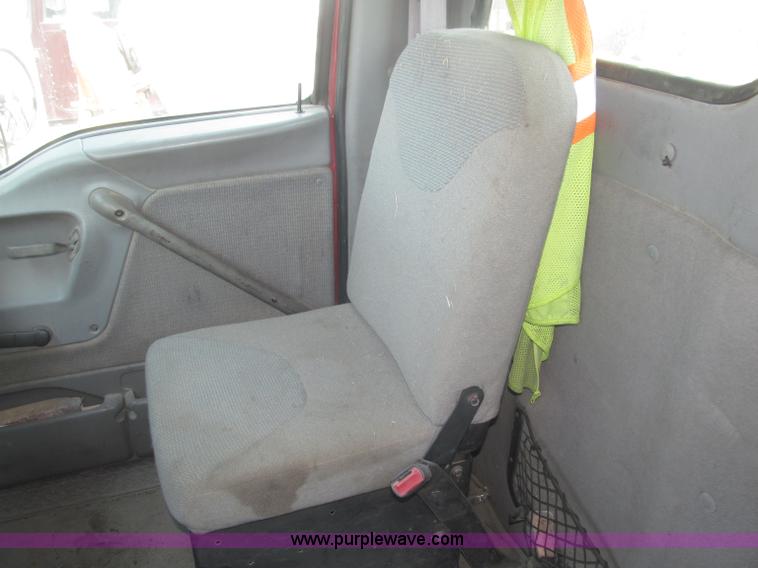 image for item F7088 1997 Ford LT9513 Louisville 113 triple axle semi truck