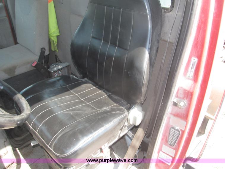 image for item F7088 1997 Ford LT9513 Louisville 113 triple axle semi truck