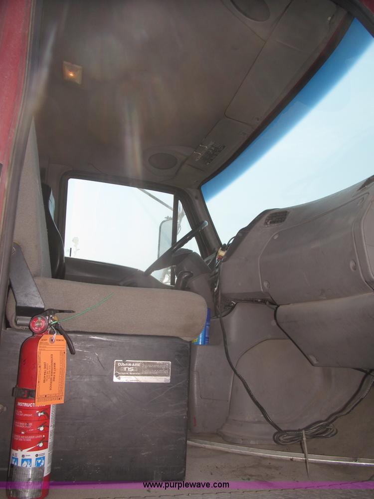 image for item F7088 1997 Ford LT9513 Louisville 113 triple axle semi truck