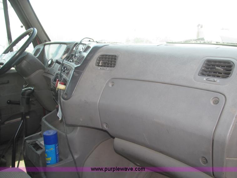 image for item F7088 1997 Ford LT9513 Louisville 113 triple axle semi truck