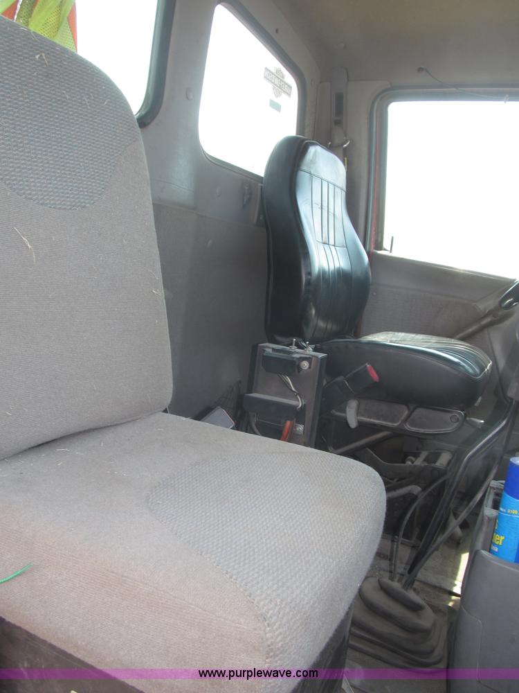 image for item F7088 1997 Ford LT9513 Louisville 113 triple axle semi truck