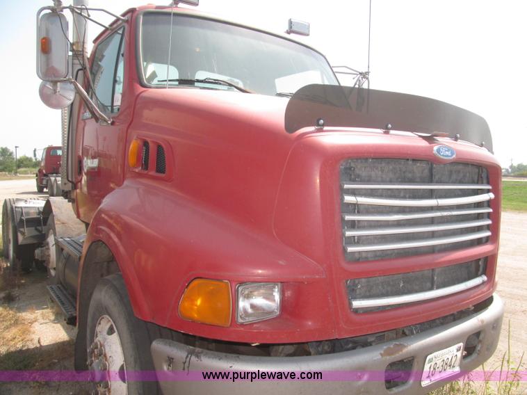 image for item F7088 1997 Ford LT9513 Louisville 113 triple axle semi truck