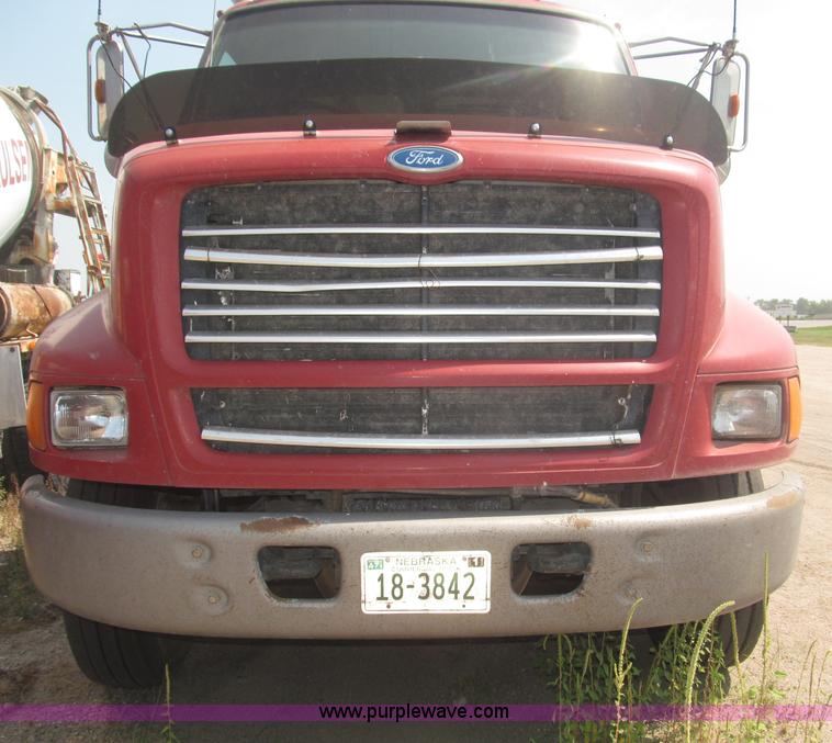 image for item F7088 1997 Ford LT9513 Louisville 113 triple axle semi truck