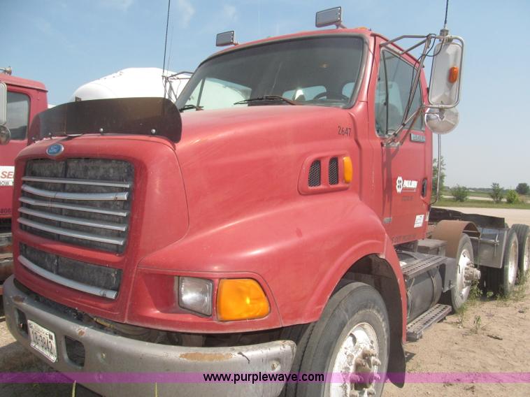 image for item F7088 1997 Ford LT9513 Louisville 113 triple axle semi truck