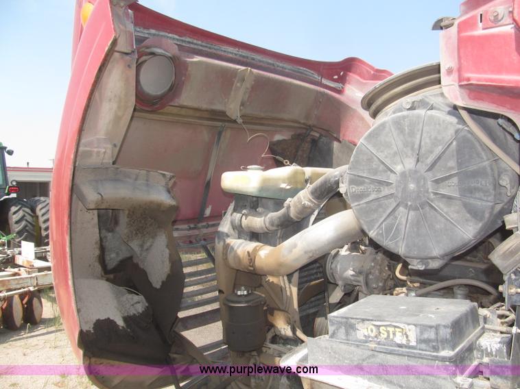 image for item F7088 1997 Ford LT9513 Louisville 113 triple axle semi truck