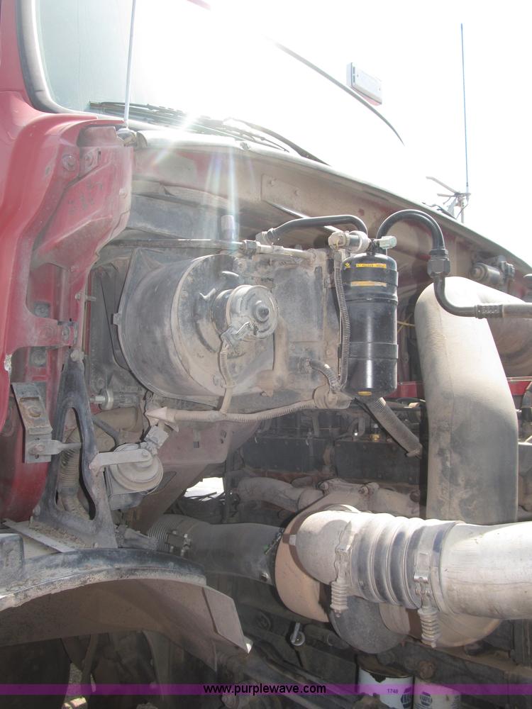 image for item F7088 1997 Ford LT9513 Louisville 113 triple axle semi truck