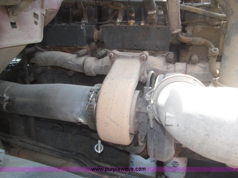 image for item F7088 1997 Ford LT9513 Louisville 113 triple axle semi truck