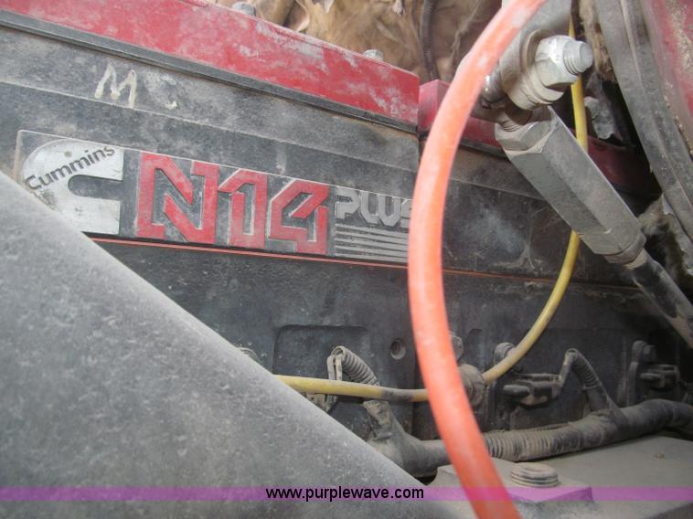 image for item F7088 1997 Ford LT9513 Louisville 113 triple axle semi truck