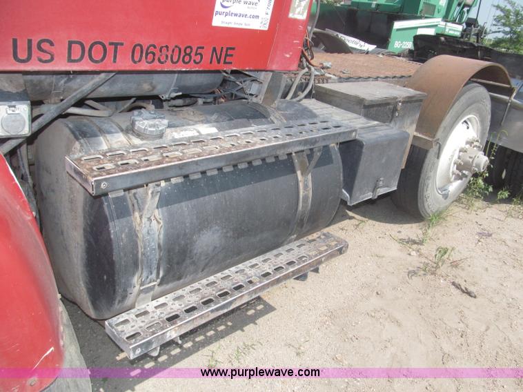 image for item F7088 1997 Ford LT9513 Louisville 113 triple axle semi truck