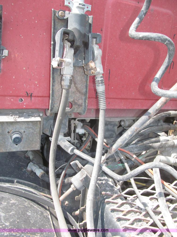 image for item F7088 1997 Ford LT9513 Louisville 113 triple axle semi truck