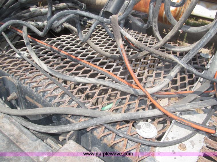 image for item F7088 1997 Ford LT9513 Louisville 113 triple axle semi truck