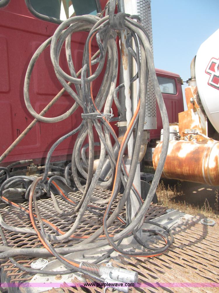 image for item F7088 1997 Ford LT9513 Louisville 113 triple axle semi truck