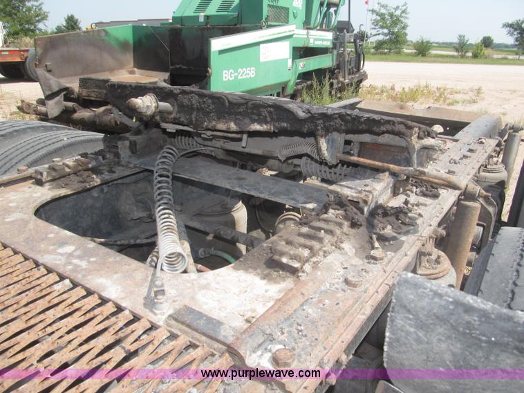 image for item F7088 1997 Ford LT9513 Louisville 113 triple axle semi truck