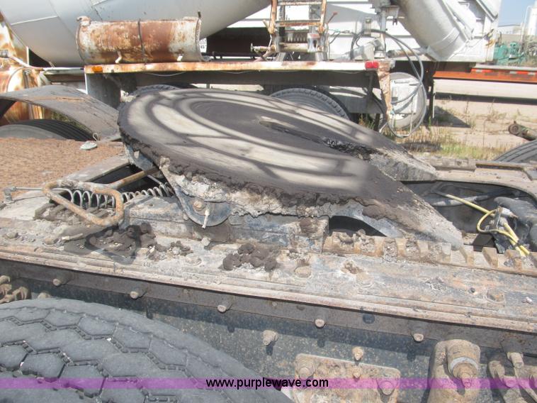 image for item F7088 1997 Ford LT9513 Louisville 113 triple axle semi truck