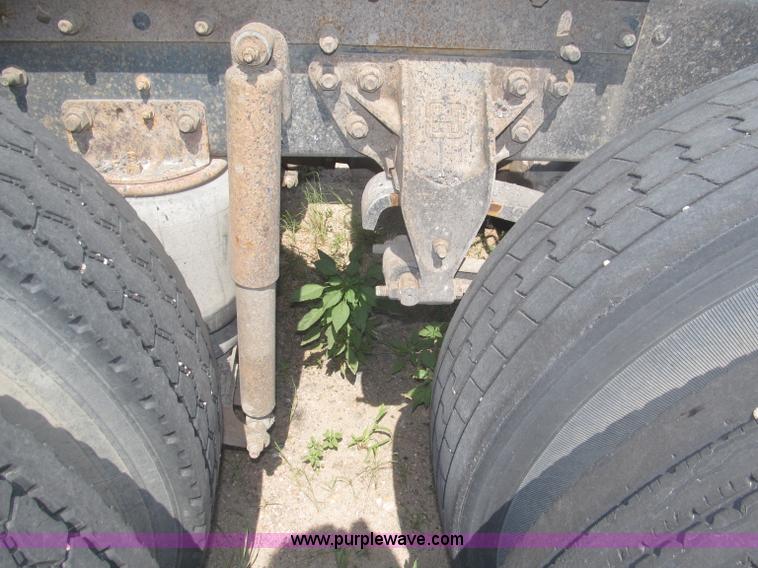 image for item F7088 1997 Ford LT9513 Louisville 113 triple axle semi truck