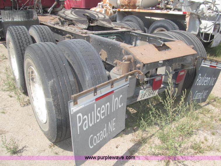 image for item F7088 1997 Ford LT9513 Louisville 113 triple axle semi truck