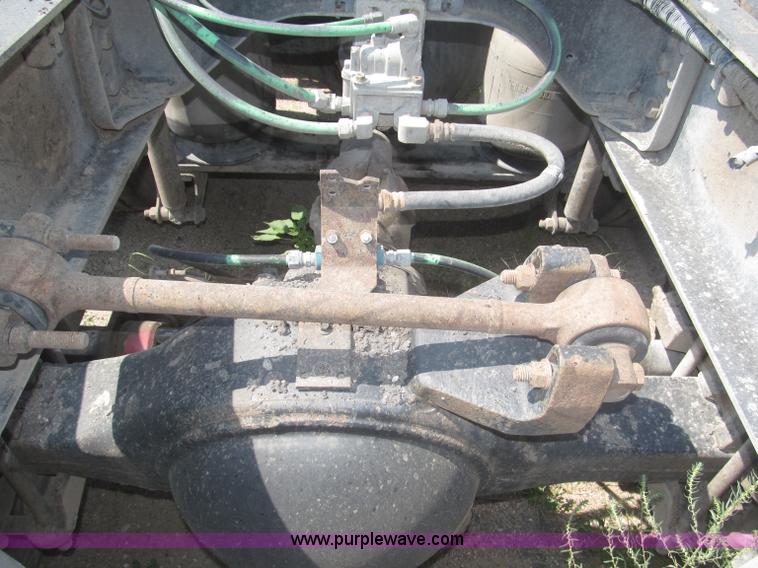 image for item F7088 1997 Ford LT9513 Louisville 113 triple axle semi truck