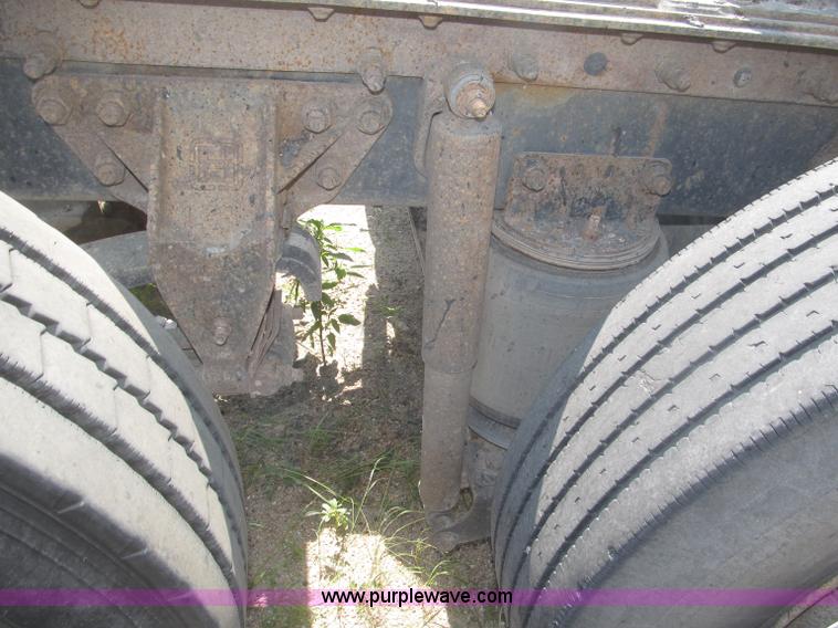 image for item F7088 1997 Ford LT9513 Louisville 113 triple axle semi truck