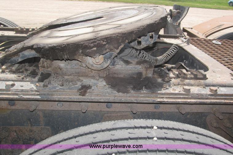 image for item F7088 1997 Ford LT9513 Louisville 113 triple axle semi truck