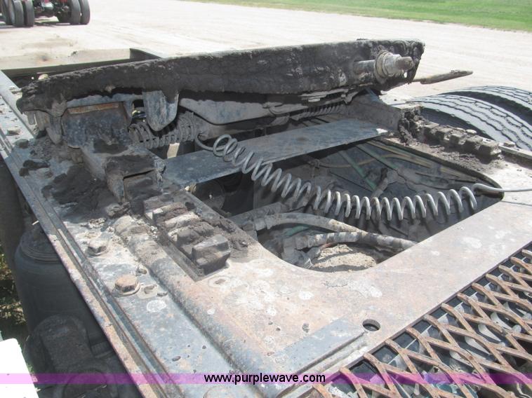 image for item F7088 1997 Ford LT9513 Louisville 113 triple axle semi truck