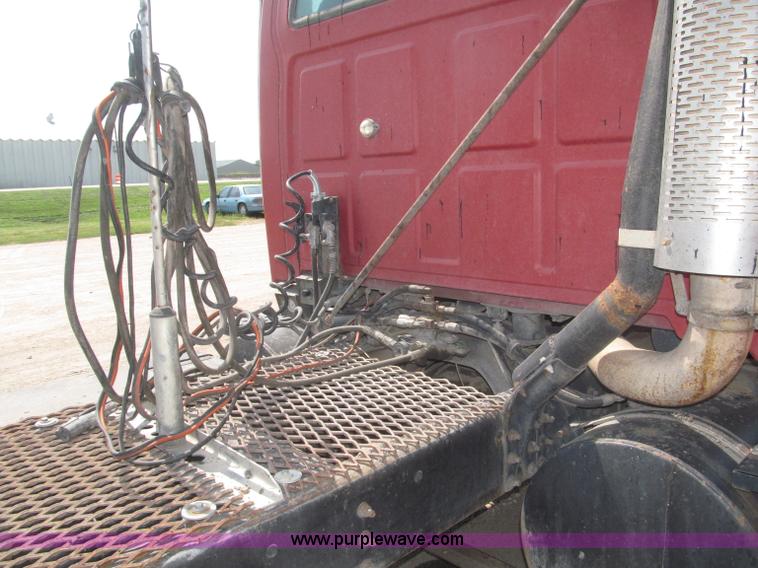 image for item F7088 1997 Ford LT9513 Louisville 113 triple axle semi truck