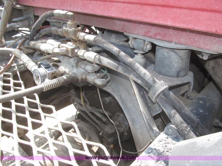 image for item F7088 1997 Ford LT9513 Louisville 113 triple axle semi truck