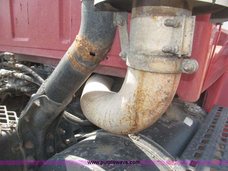 image for item F7088 1997 Ford LT9513 Louisville 113 triple axle semi truck