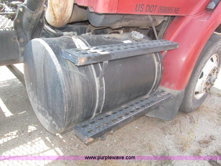 image for item F7088 1997 Ford LT9513 Louisville 113 triple axle semi truck