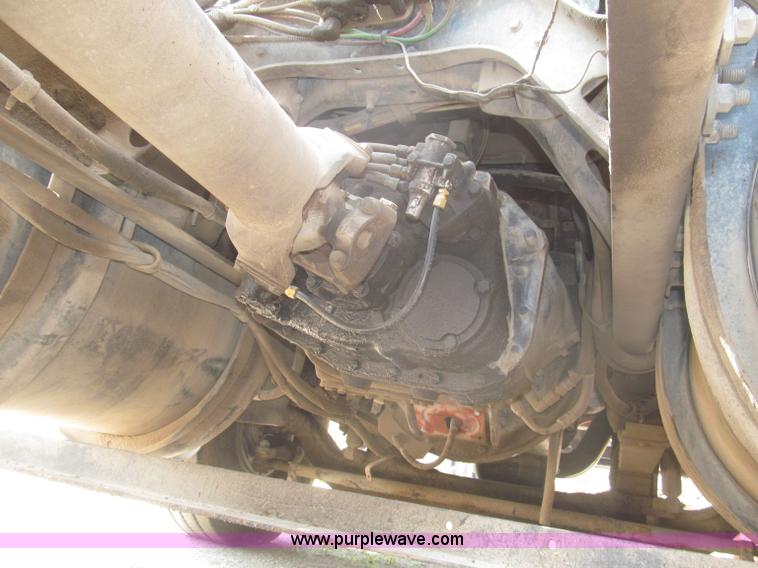 image for item F7088 1997 Ford LT9513 Louisville 113 triple axle semi truck